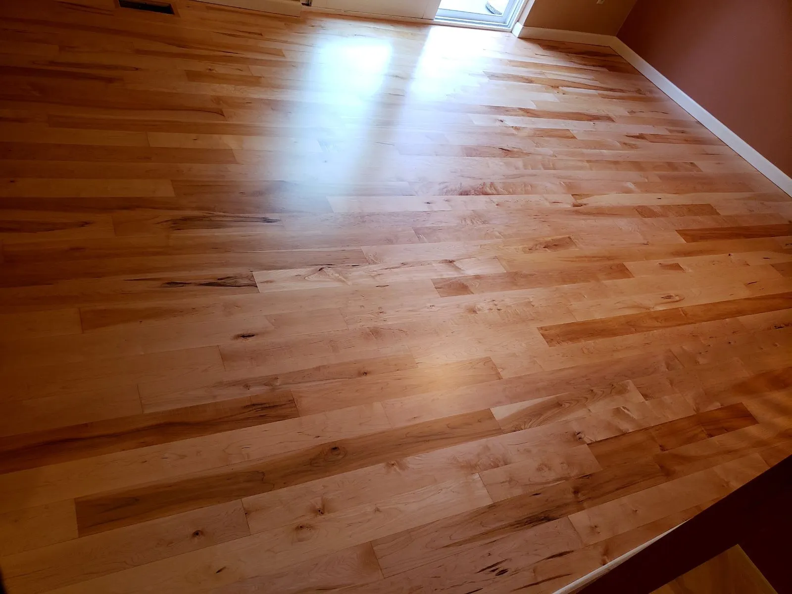 New hardwood floor in an empty room