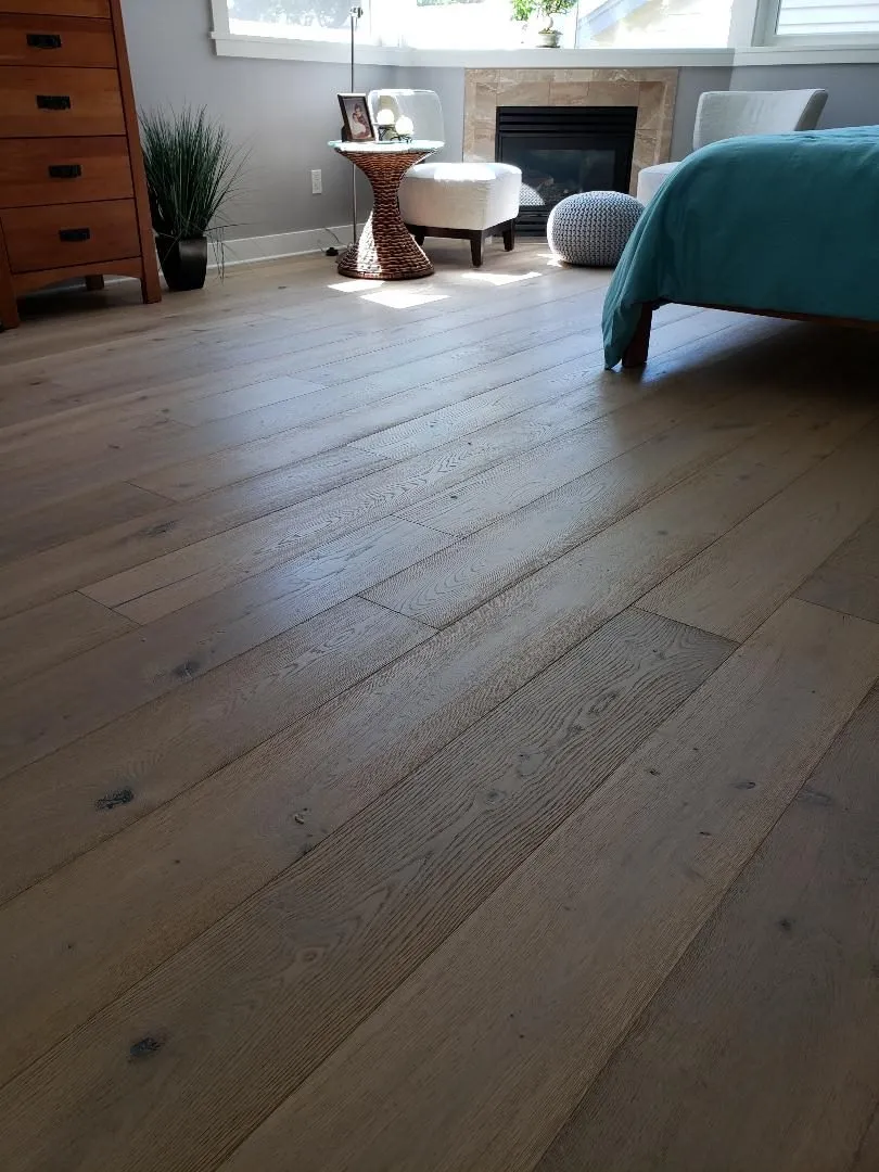 Close-up of a wide-plank wood floor